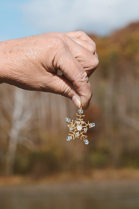 Golden snowflake pendant